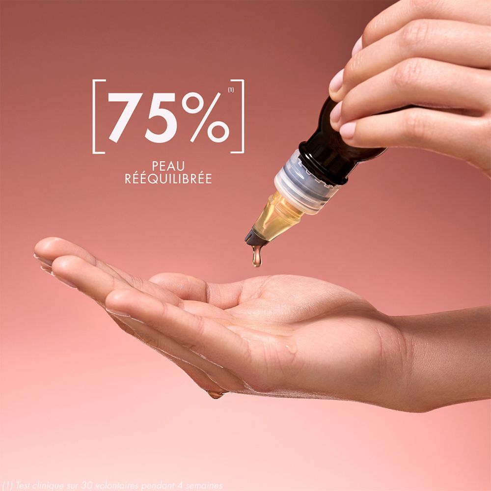 Flacon d'huile de Nigelle Melvita avec applicateur. Texte en français pour Visage & Corps.