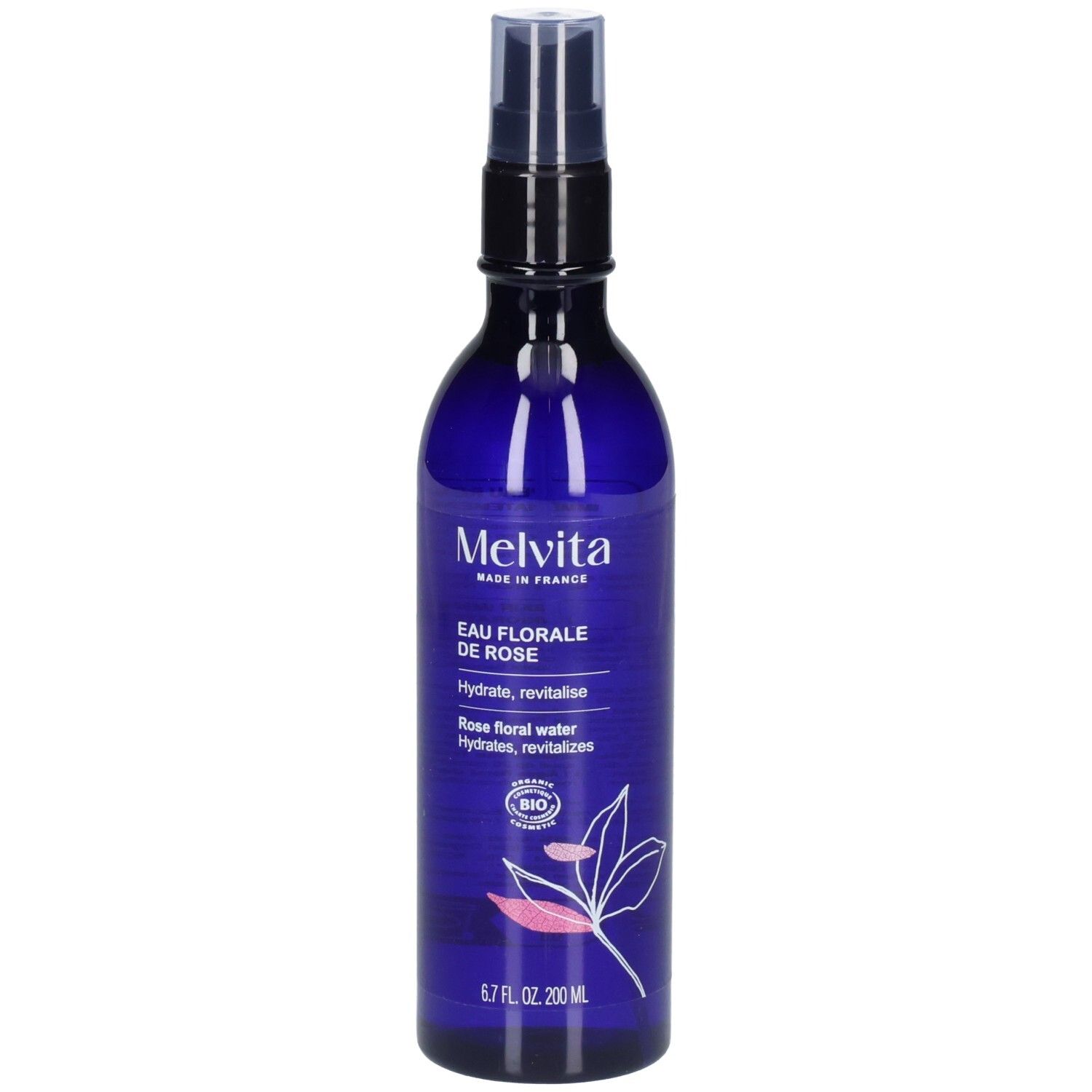 Melvita Eau Florale de Rose, flacon spray bleu avec étiquette, légèrement en biais.