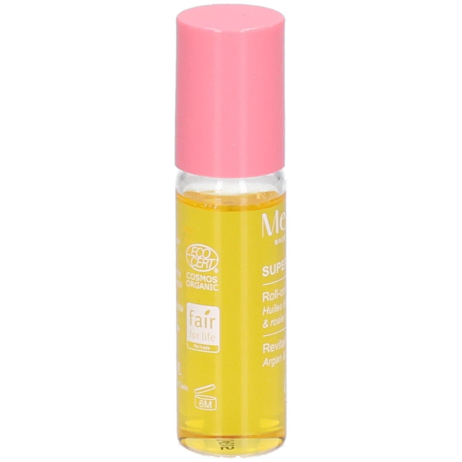 Roll-on Melvita avec bouchon rose, contenant une huile jaune. Labels COSMOS ORGANIC et Fair for Life.