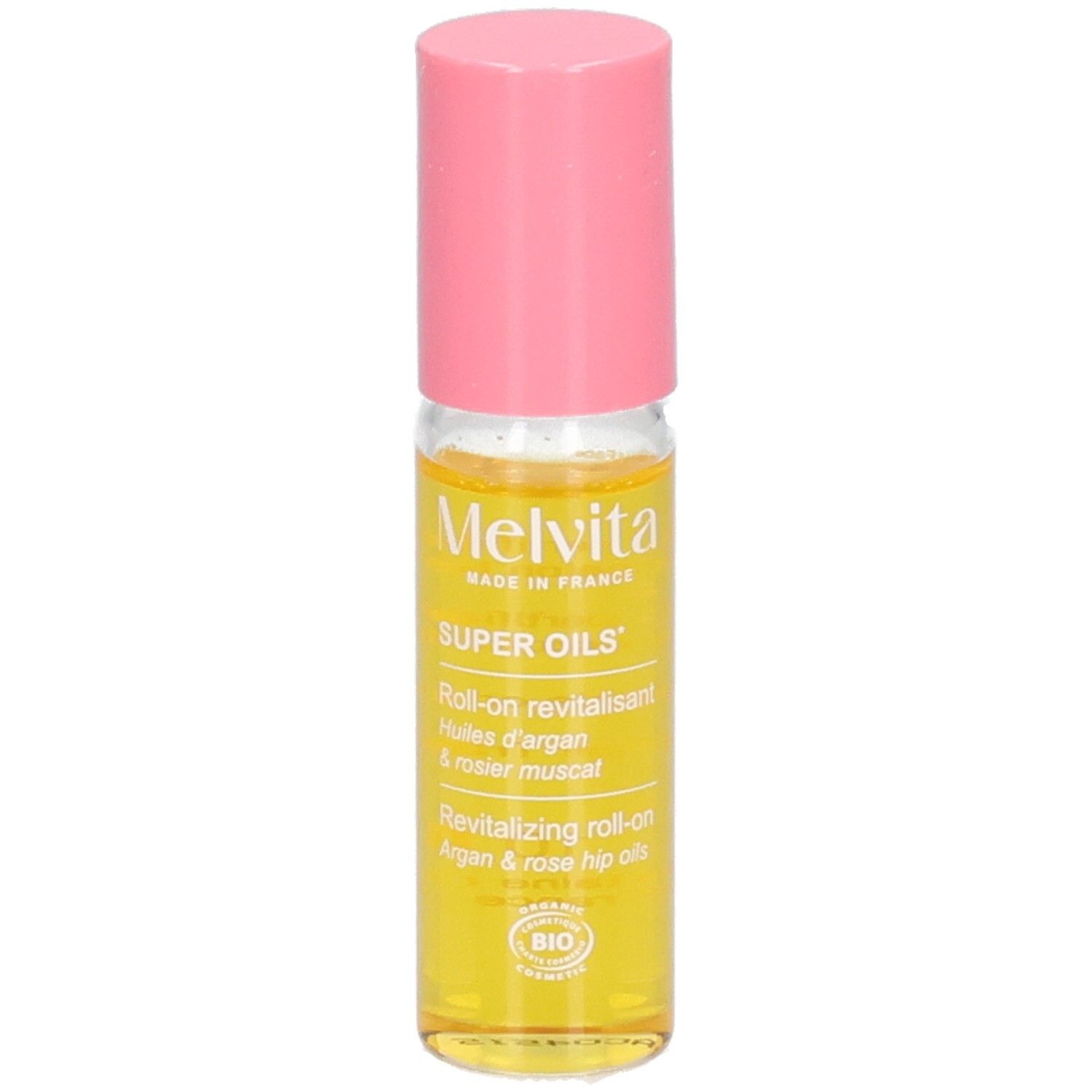 Roll-on Melvita 'SUPER OILS'. Huile jaune en flacon de verre avec bouchon rose. Étiquette 'Argan & Rosehip'.