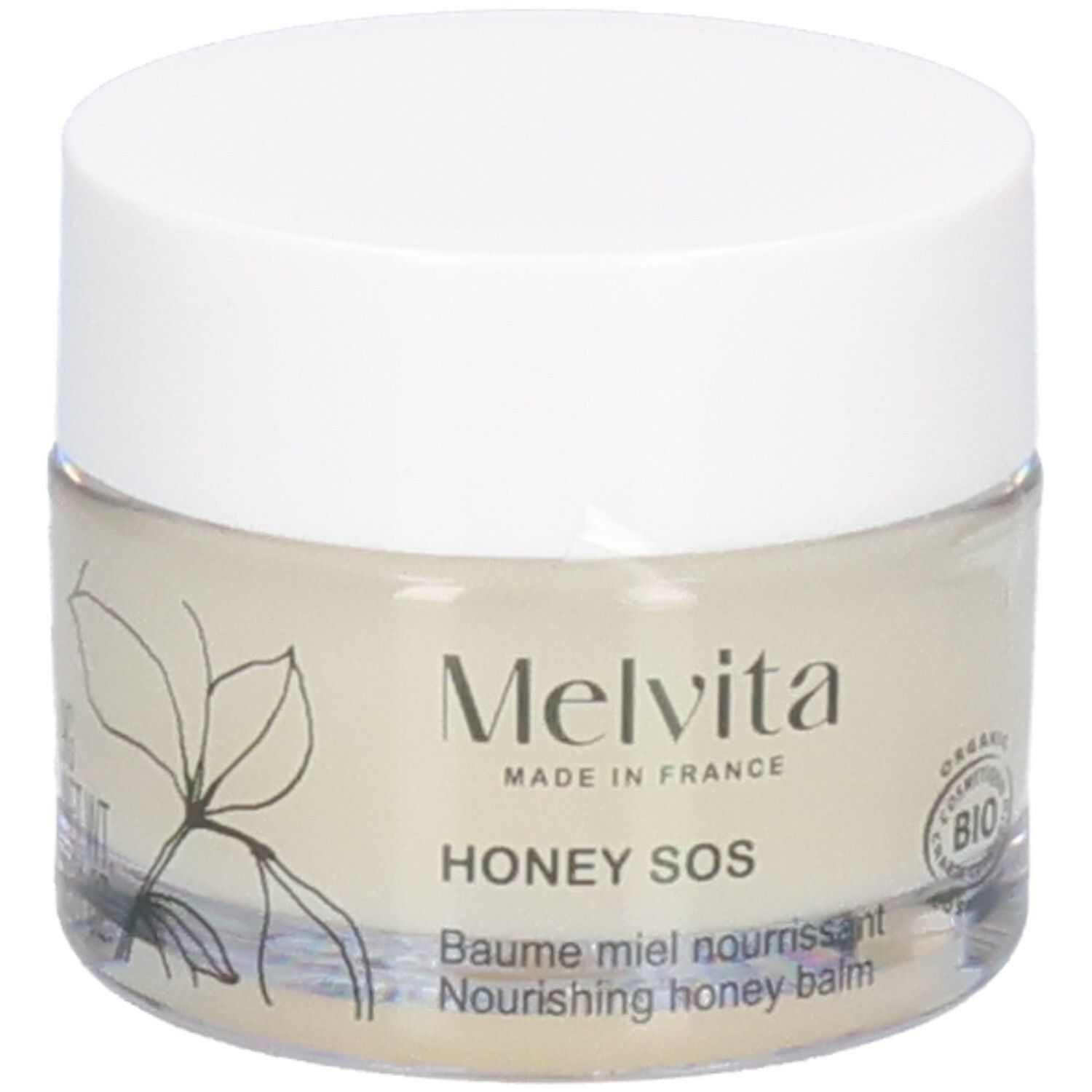 Melvita Honing SOS Balsem: Glazen pot met witte deksel. Voorkant met plantentekening en BIO-zegel.