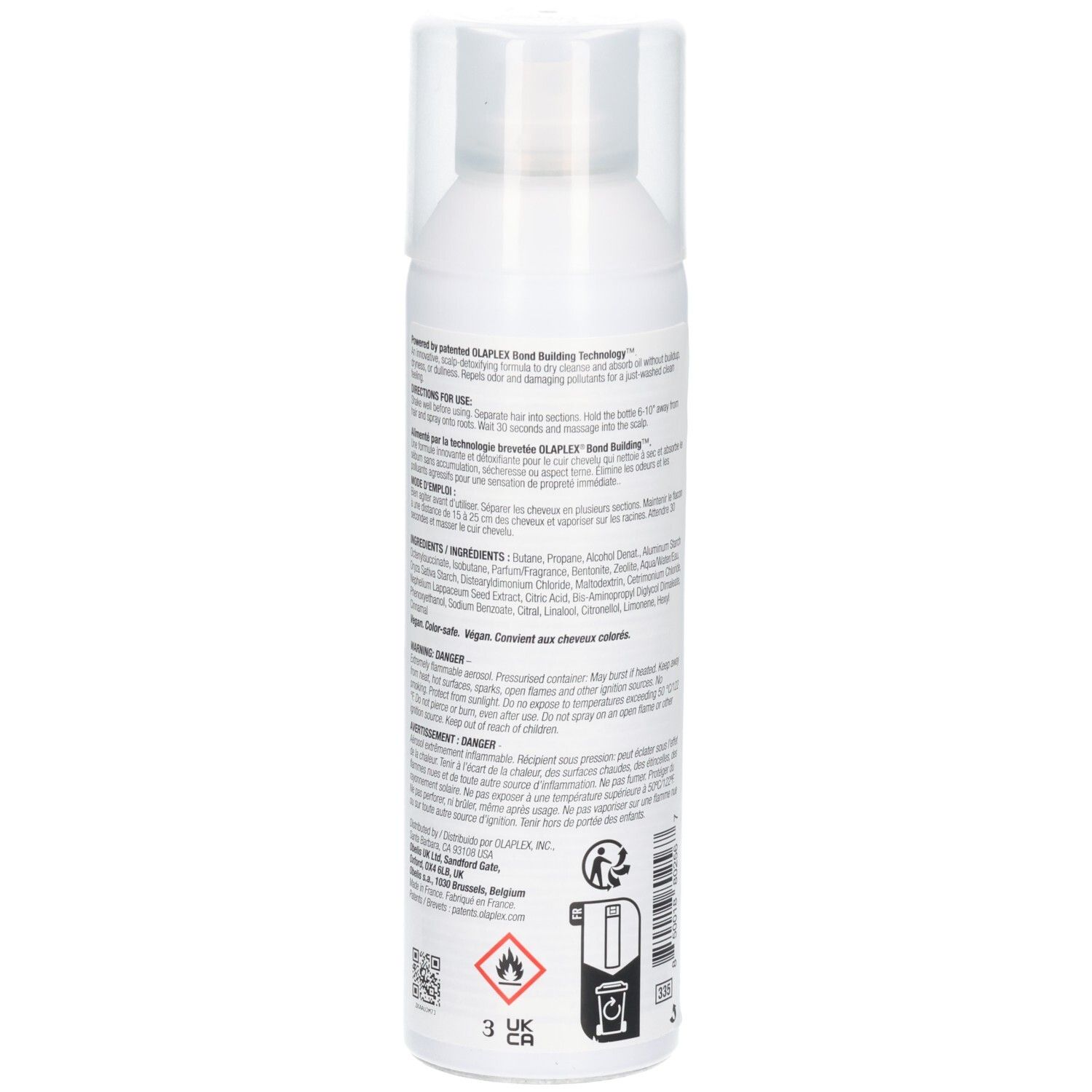 Arrière d'un flacon pulvérisateur blanc avec shampooing sec Olaplex Nº.4D Clean Volume Detox. Contient des avertissements et des marques de certification.