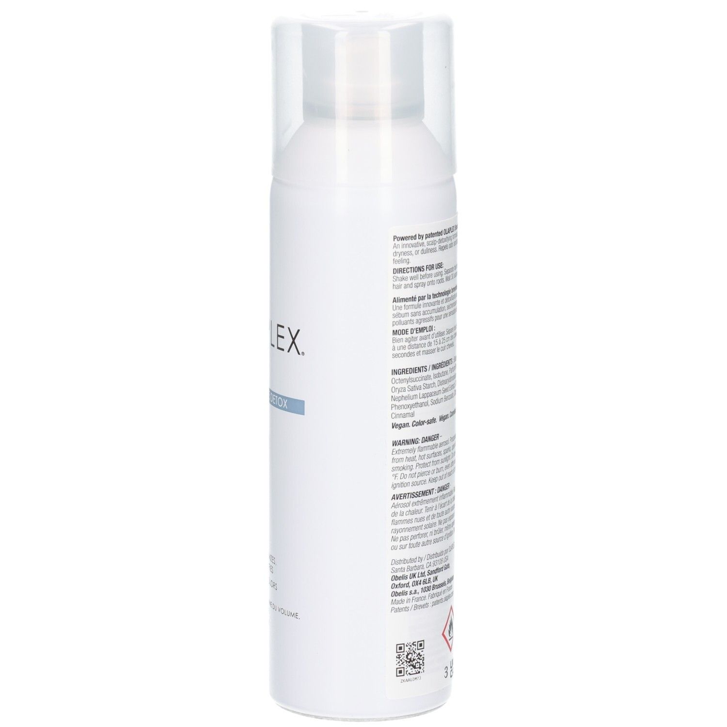 Vue latérale d'un flacon pulvérisateur blanc avec shampooing sec Olaplex Nº.4D Clean Volume Detox. Contient les ingrédients et les instructions.