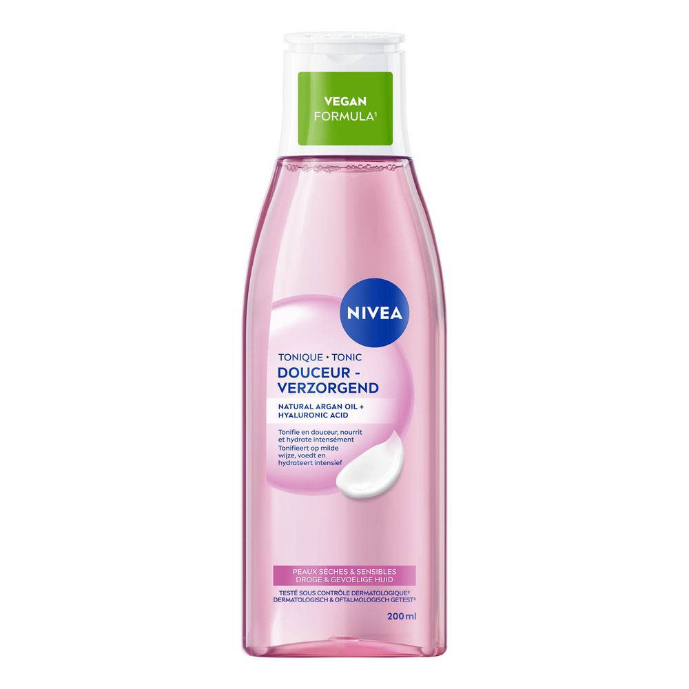 Bouteille Nivea Tonique Douceur, liquide rose, bouchon blanc, motif fleur d'amandier.