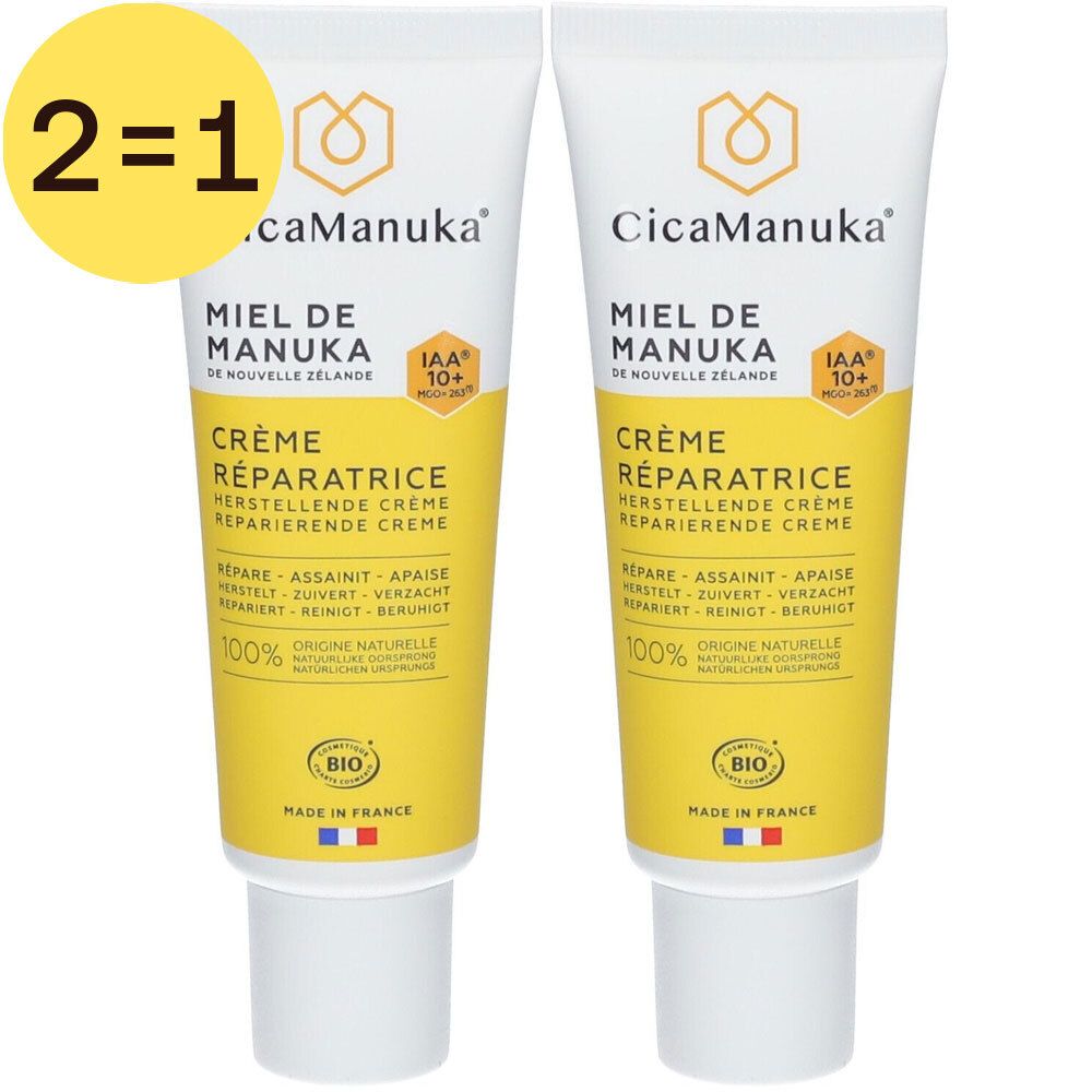 Deux tubes de CicaManuka Crème Réparatrice. Texte jaune sur fond blanc. Inscription : Miel de Manuka, Crème Réparatrice.