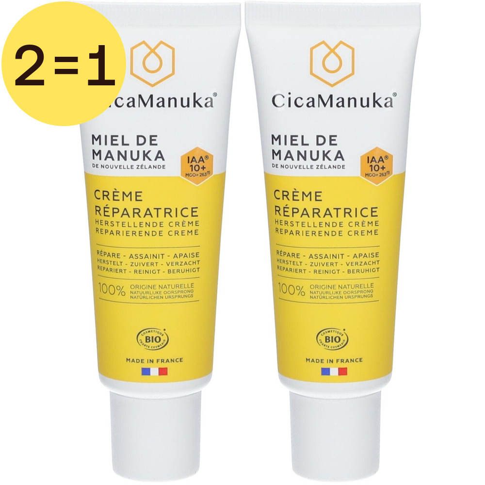 Twee tubes CicaManuka Crème Réparatrice. Gele tekst op witte achtergrond. Opschrift: Miel de Manuka, Crème Réparatrice.