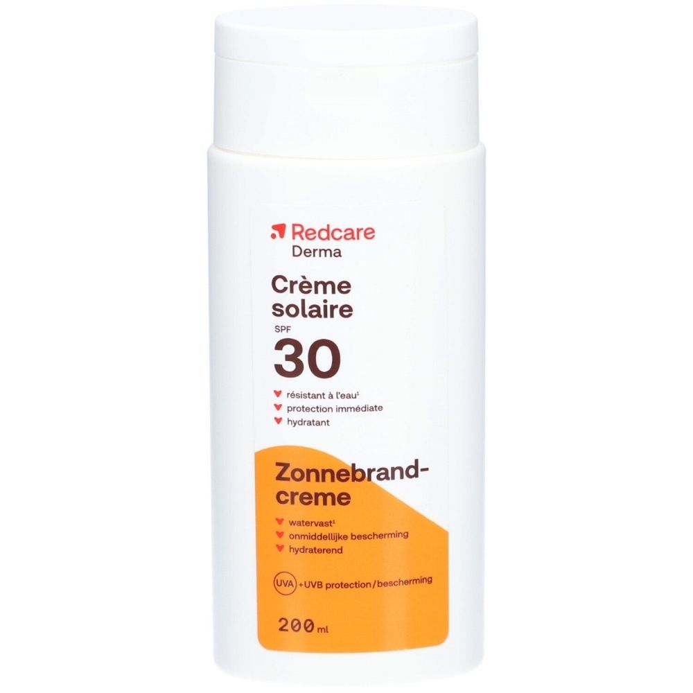 Redcare Derma Crème solaire SPF 30. Flacon blanc avec bouchon rabattable. Texte: Crème solaire, Zonnebrandcrème, 200ml.