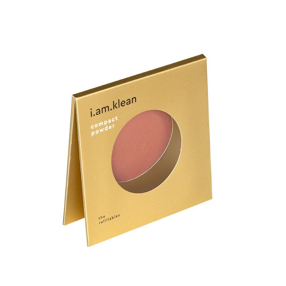 Gouden verpakking, half open. Zichtbaar: roze blush. Merk: i.am.klean. Tekst: "compact powder".