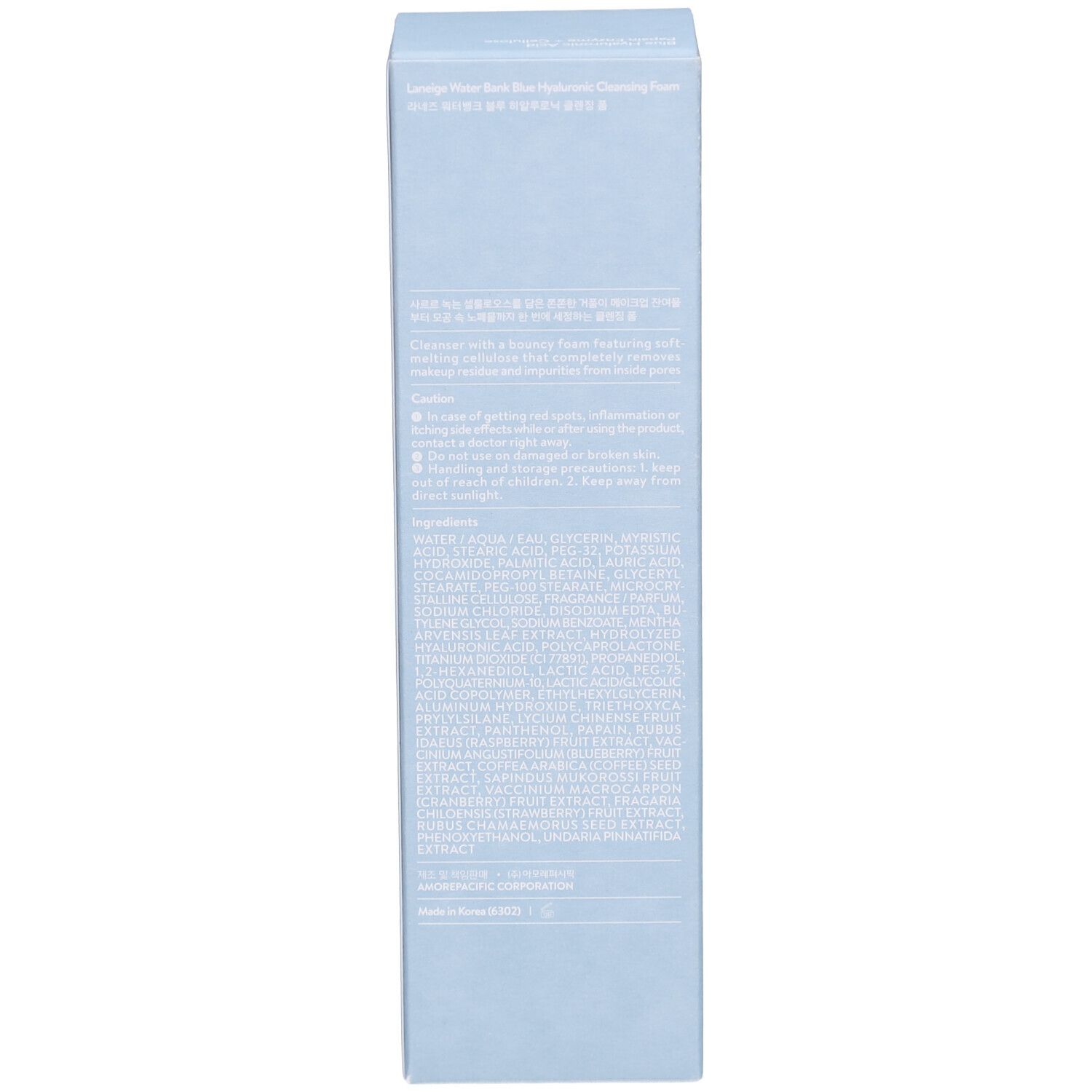 Côté de la boîte bleu clair. Texte en plusieurs langues. Ingrédients et instructions d'utilisation.