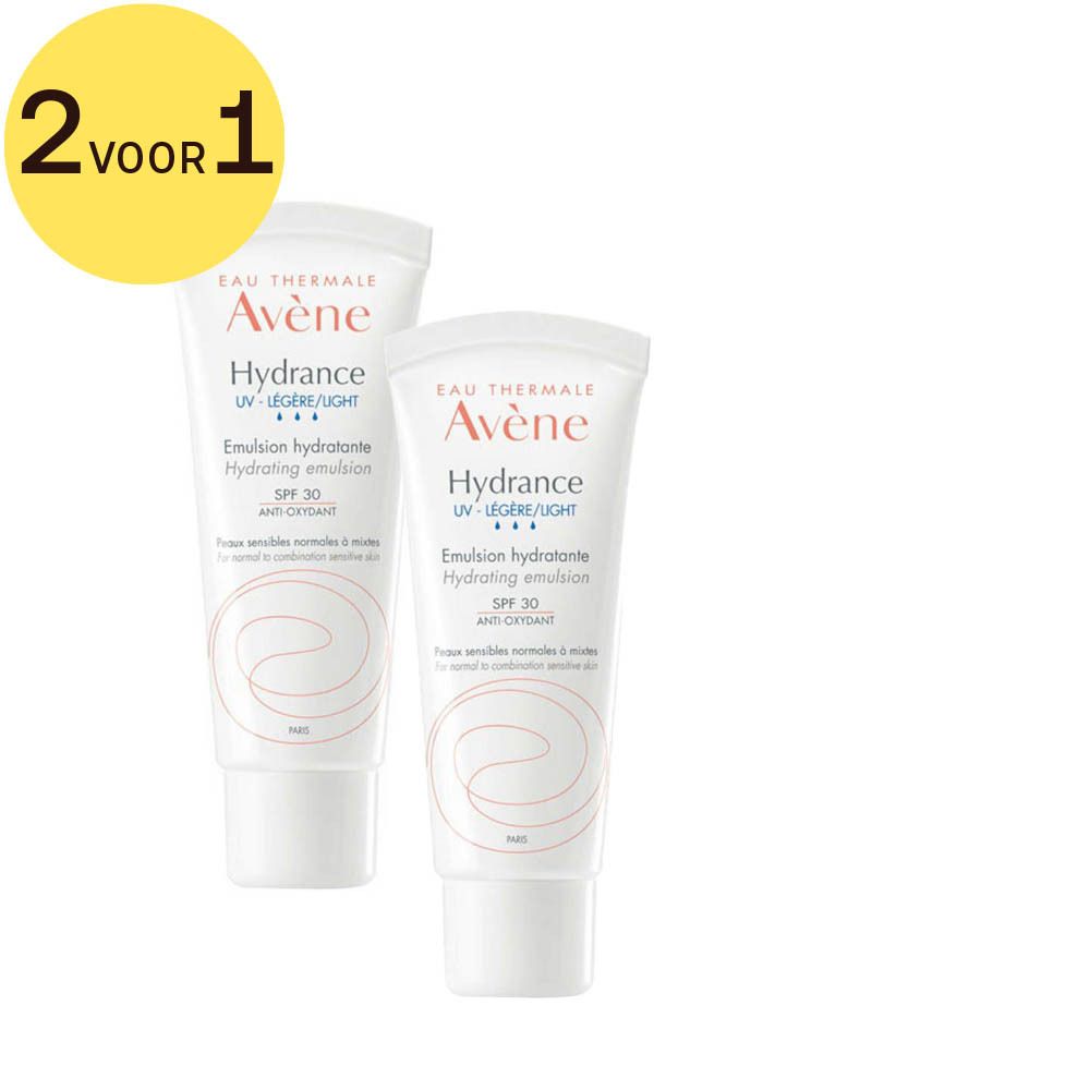 Twee witte tubes met tekst en SPF30. Gele sticker "2 voor 1".