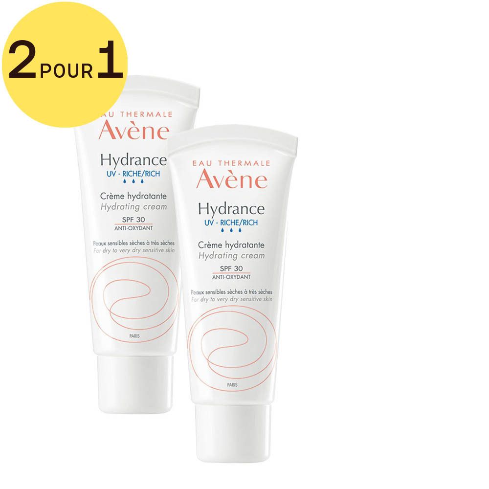 Deux tubes de crème Avène Hydrance. Tubes blancs avec texte rouge. SPF 30 et autocollant '2 pour 1'.