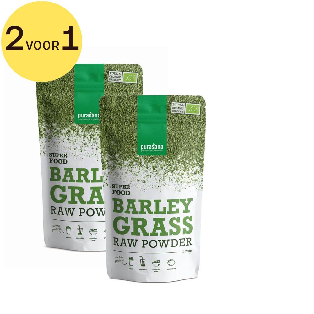 Twee zakken Purasana Barley Grass Raw Powder. Groen-witte verpakking met productnaam en bio-label. Gele cirkel met "2 VOOR 1". 