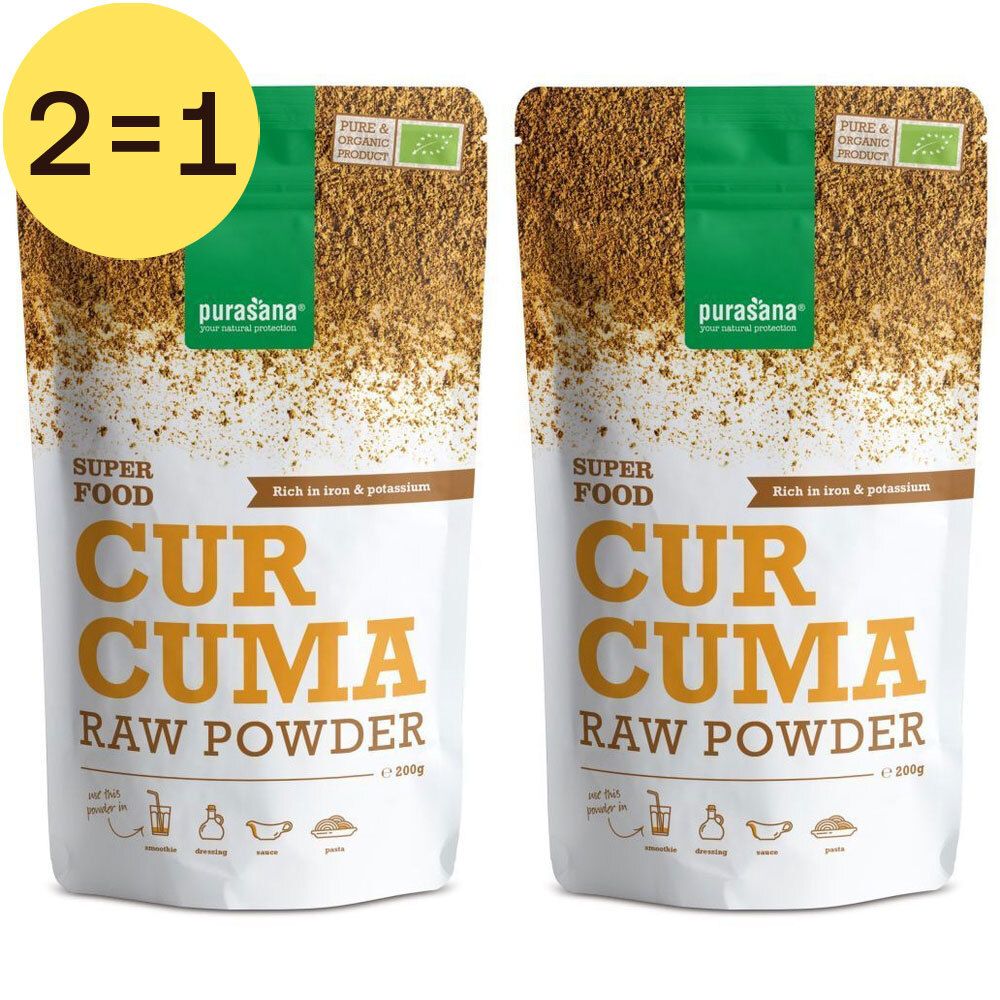 Twee zakken Purasana Curcuma poeder. Opschrift '2=1'. Bio-label. 'Superfood', 'Curcuma Raw Powder'.