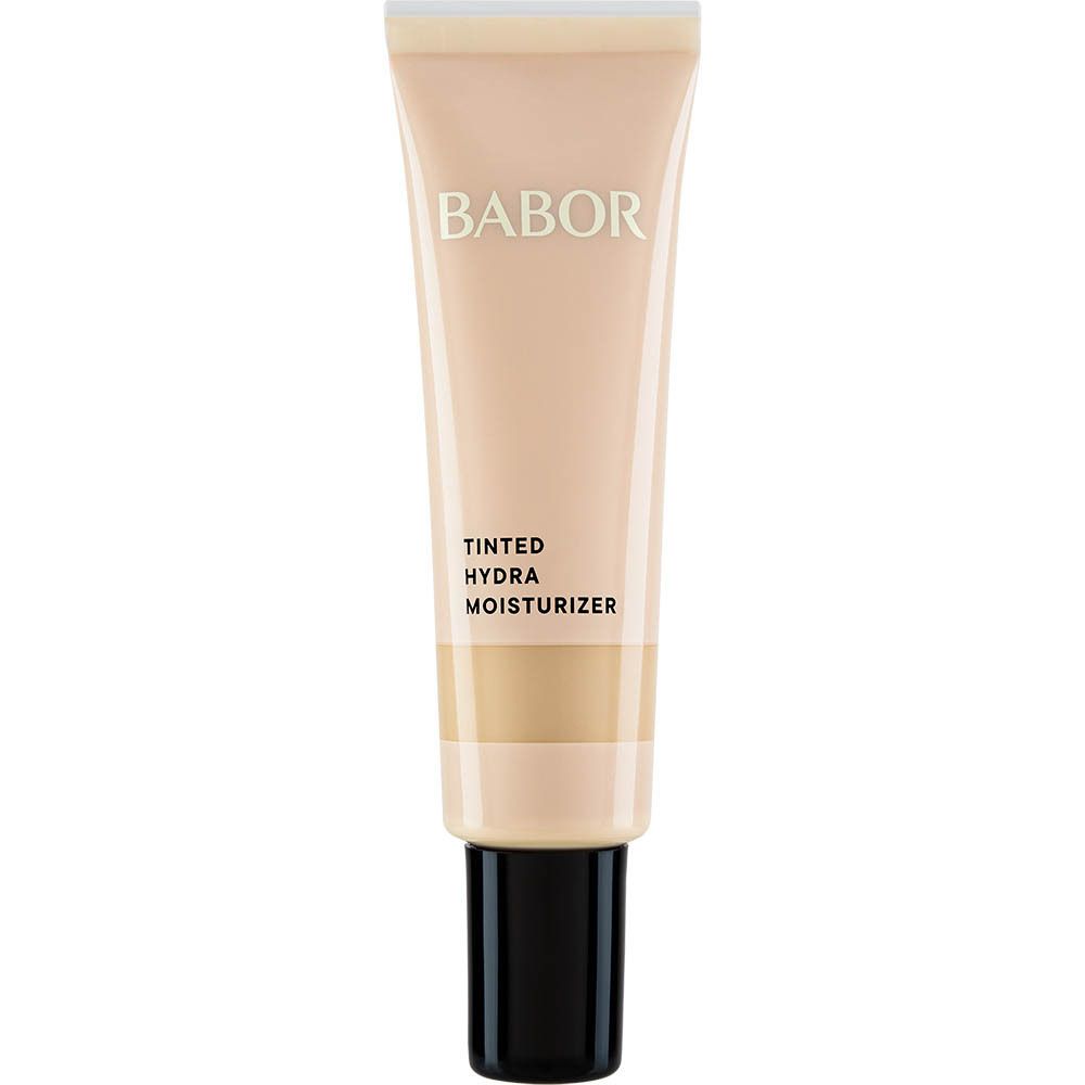 BABOR® Tinted Hydra Moisturizer tube. Beige tube met zwarte pomp. Tekst: TINTED HYDRA MOISTURIZER.