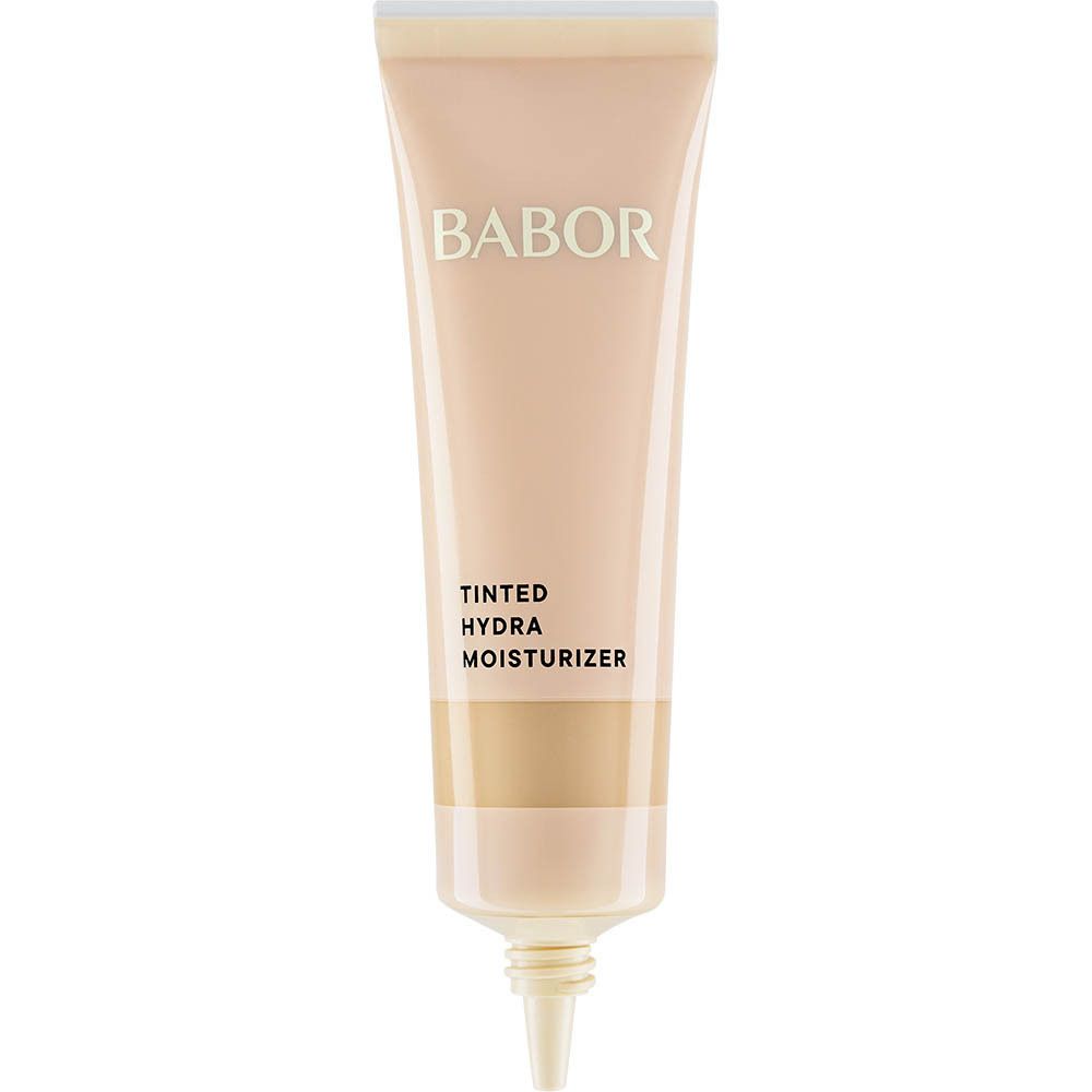BABOR® Tinted Hydra Moisturizer tube. Beige tube met zwarte pomp. Tekst: TINTED HYDRA MOISTURIZER.