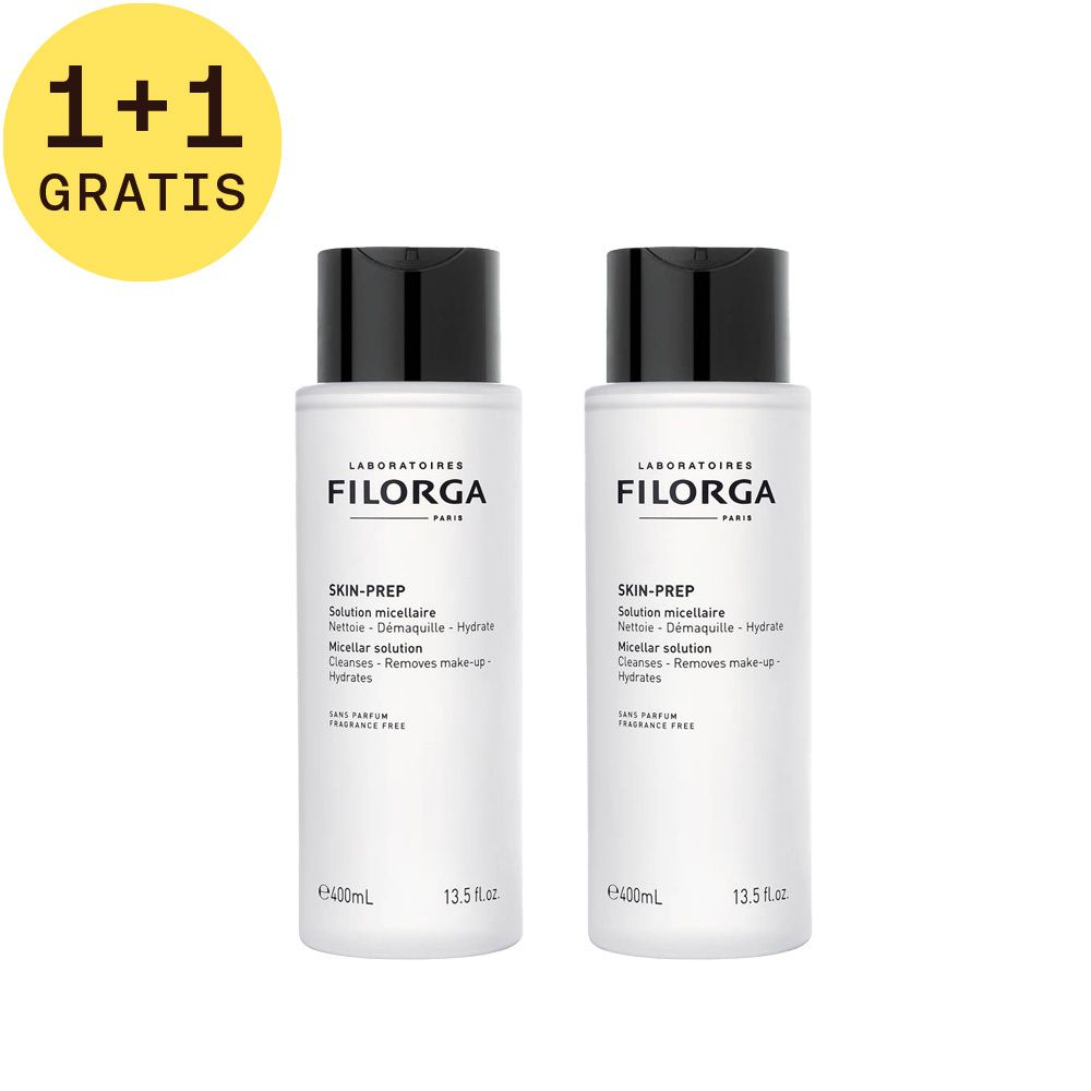 Twee witte flessen met zwarte dop. Opschrift: Filorga Skin-Prep Solution micellaire. 1+1 GRATUIT.