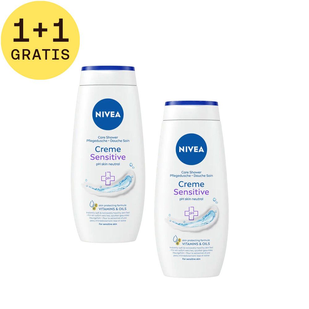Twee witte douchegelflessen met blauwe dop. Opschrift: NIVEA, Creme Sensitive, pH huidneutraal. Label 1+1 GRATIS.