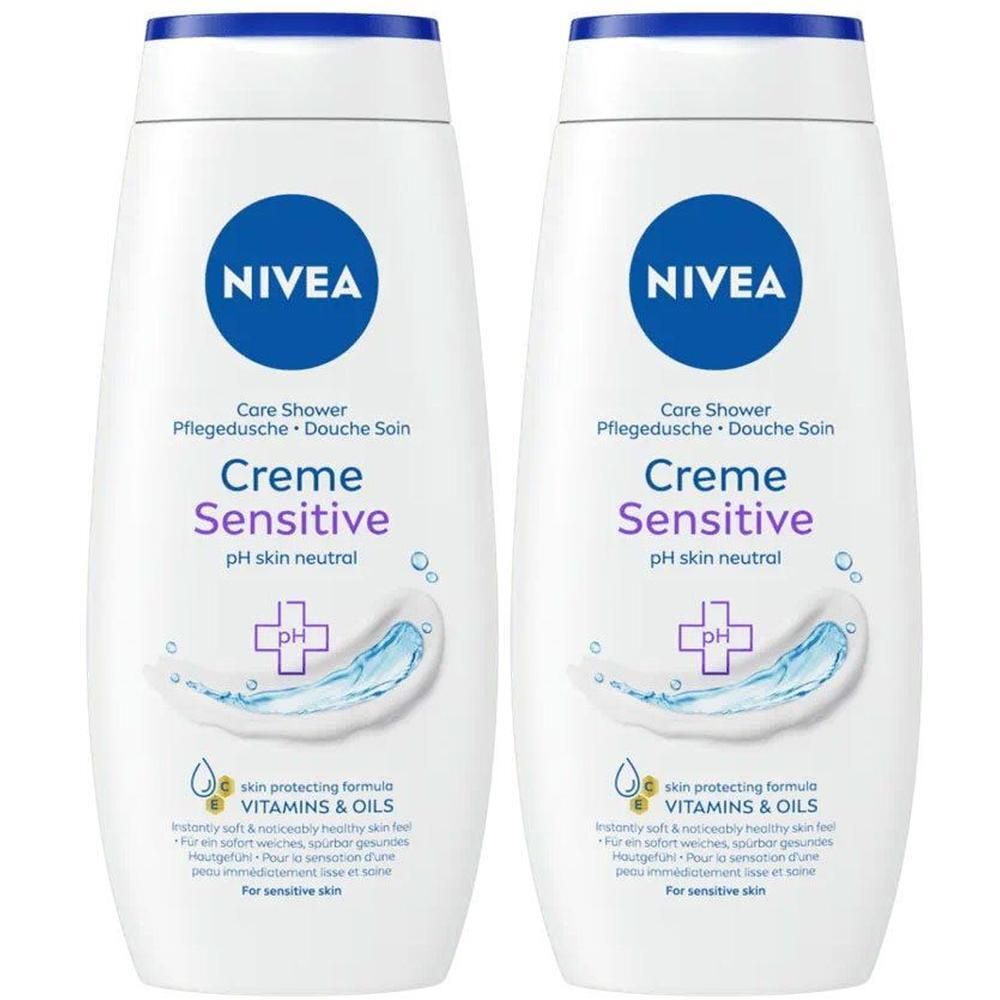 Twee witte douchegelflessen met blauwe dop. Opschrift: NIVEA, Creme Sensitive, pH huidneutraal. Afbeelding van water en logo.
