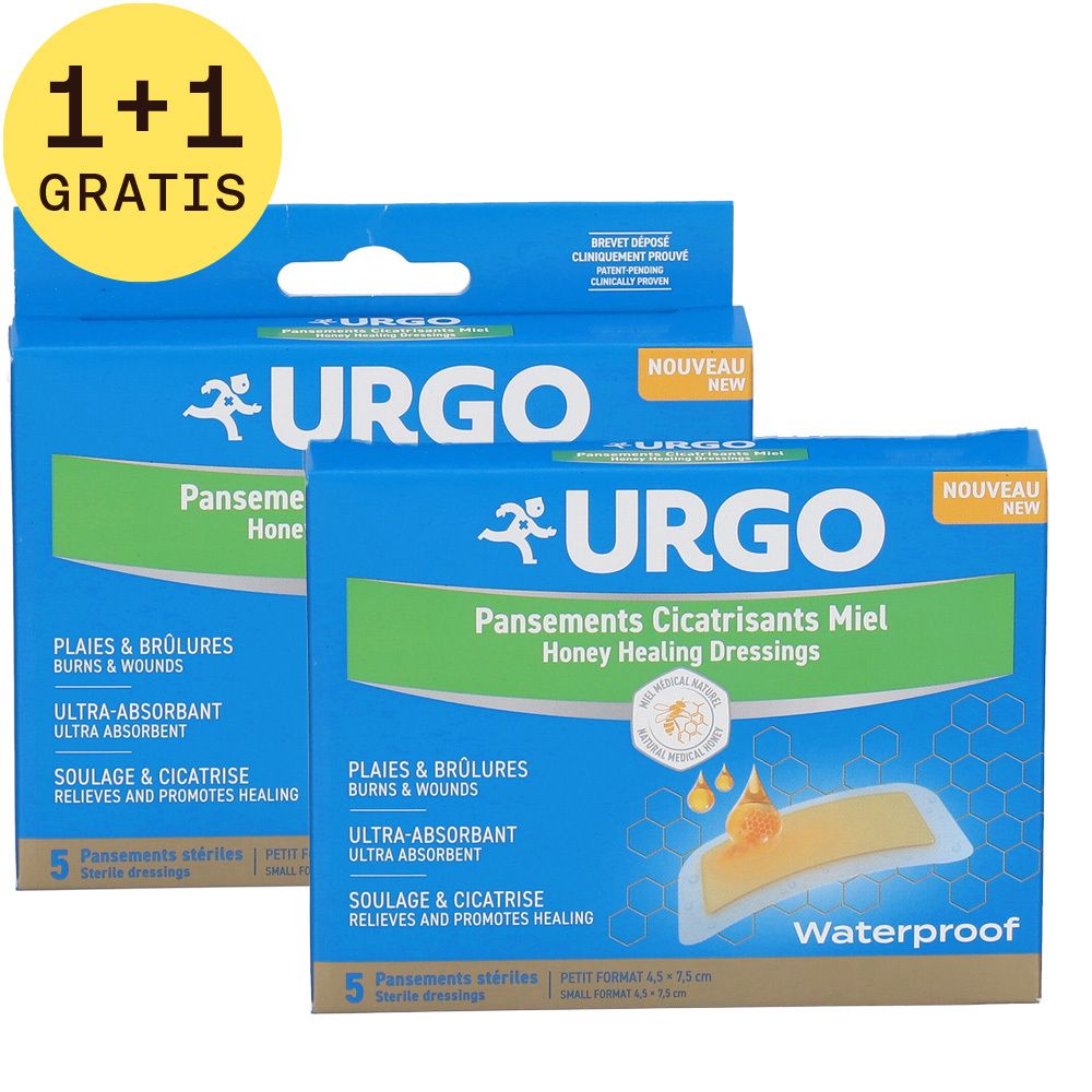 Blauwe Urgo-verpakking met 'Pansements Cicatrisants Miel'. '1+1 GRATUIT' sticker. 5 steriele verbanden.