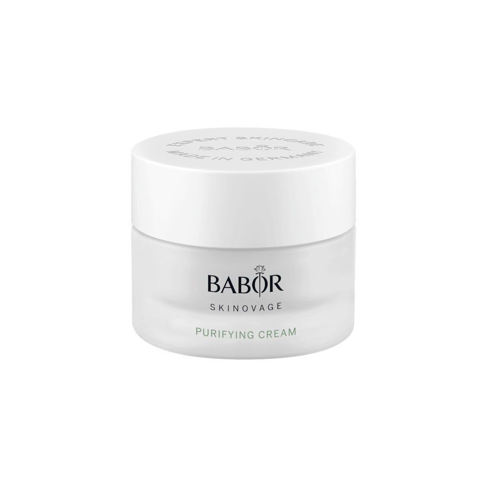 Crèmepot met witte deksel. Op de pot staat BABOR SKINAVAGE PURIFYING CREAM.