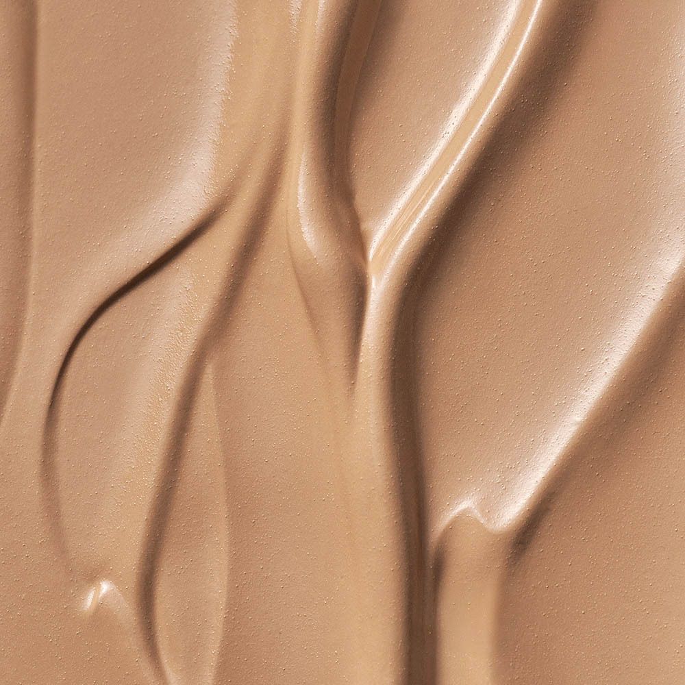 Close-up van BB Cream. Crème in lichtbruine kleur, gladde textuur.