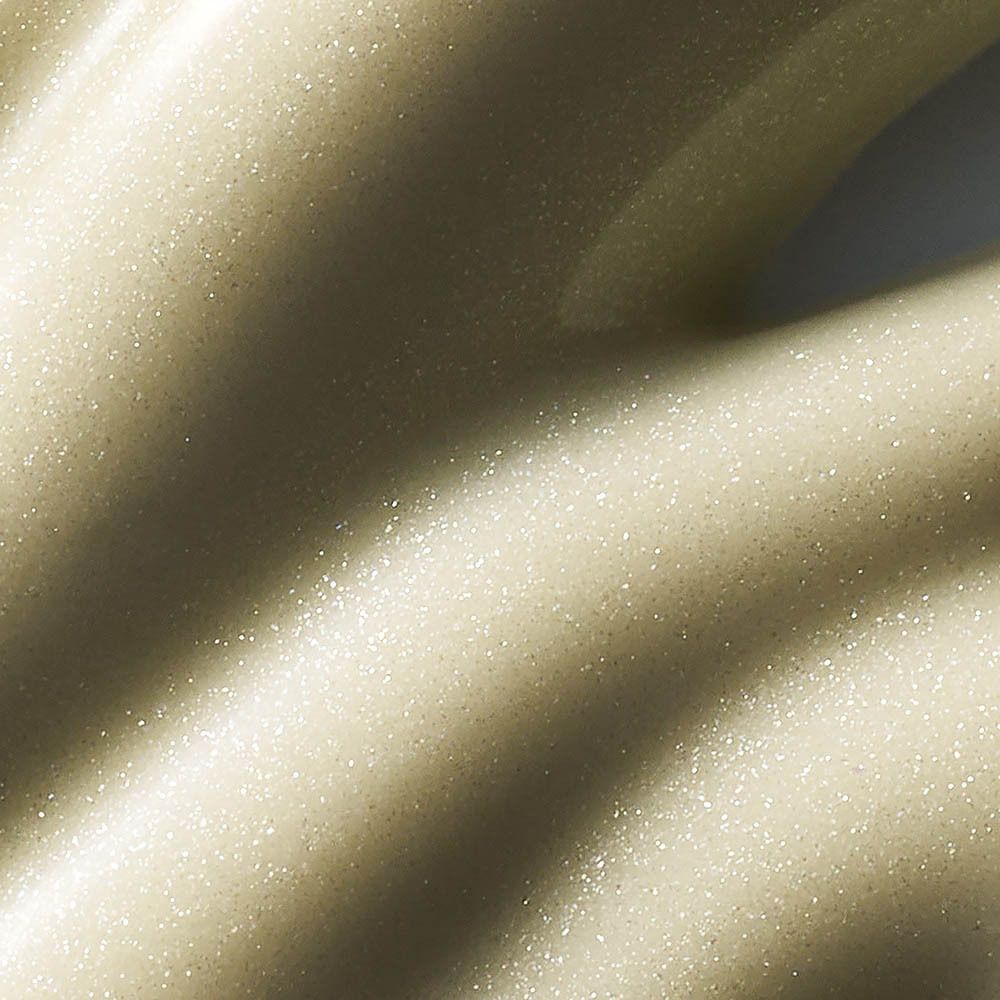 Close-up van de oogcrème. Romige textuur met een lichte glans.