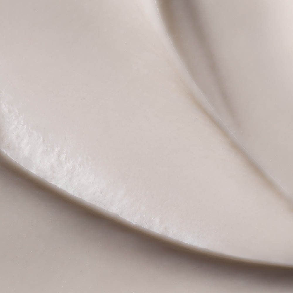 Gros plan d'une crème. Texture crème.
