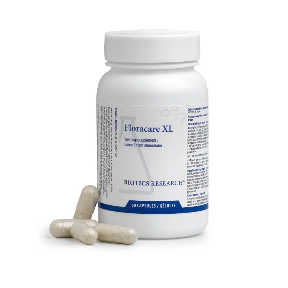 Un flacon de Biotics Research Floracare XL avec trois gélules devant.