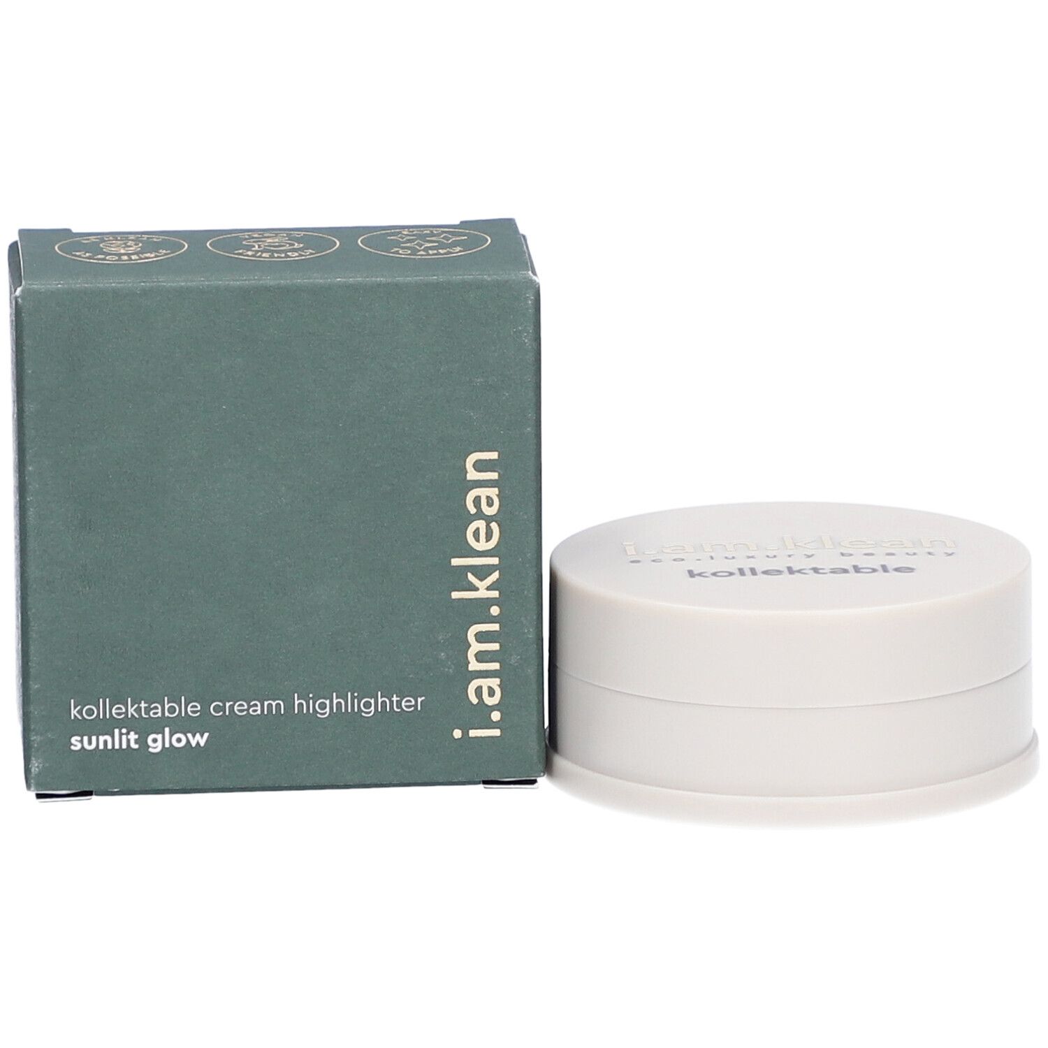 Groene doos en crèmekleurige container. Op de doos staat i.am.klean, kollektable cream highlighter sunlit glow. De container heeft een deksel met tekst.