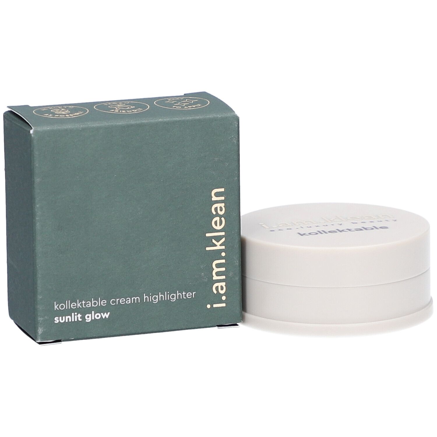 Groene doos en crèmekleurige container. Op de doos staat i.am.klean, kollektable cream highlighter sunlit glow. De container heeft een deksel met tekst.