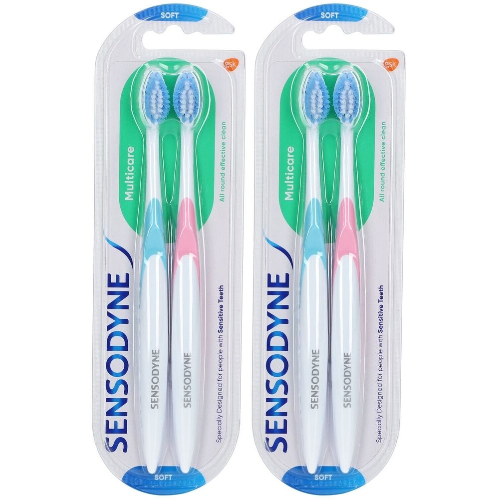 Deux brosses à dents en blister. Manches bleues et roses, soies bleues. Inscription: Sensodyne, Multicare, Soft.
