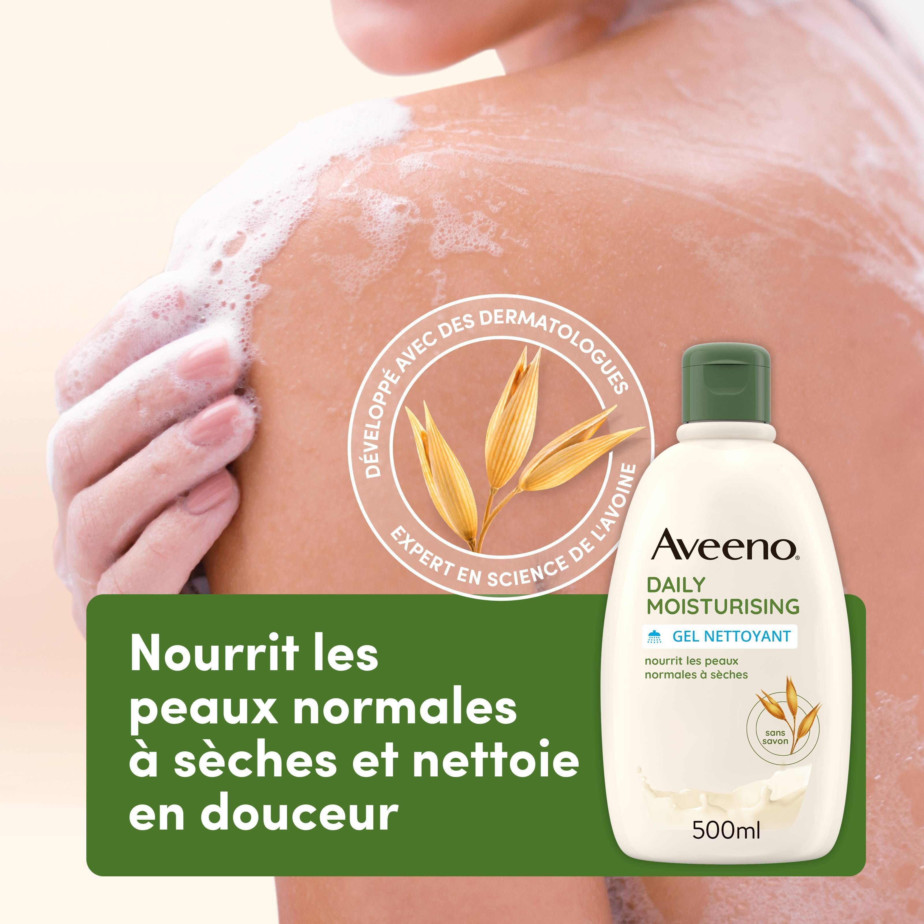 Aveeno Daily Moisturising Gel Nettoyant à côté d'une bannière verte. Texte: Nourrit les peaux normales à sèches et nettoie en douceur.