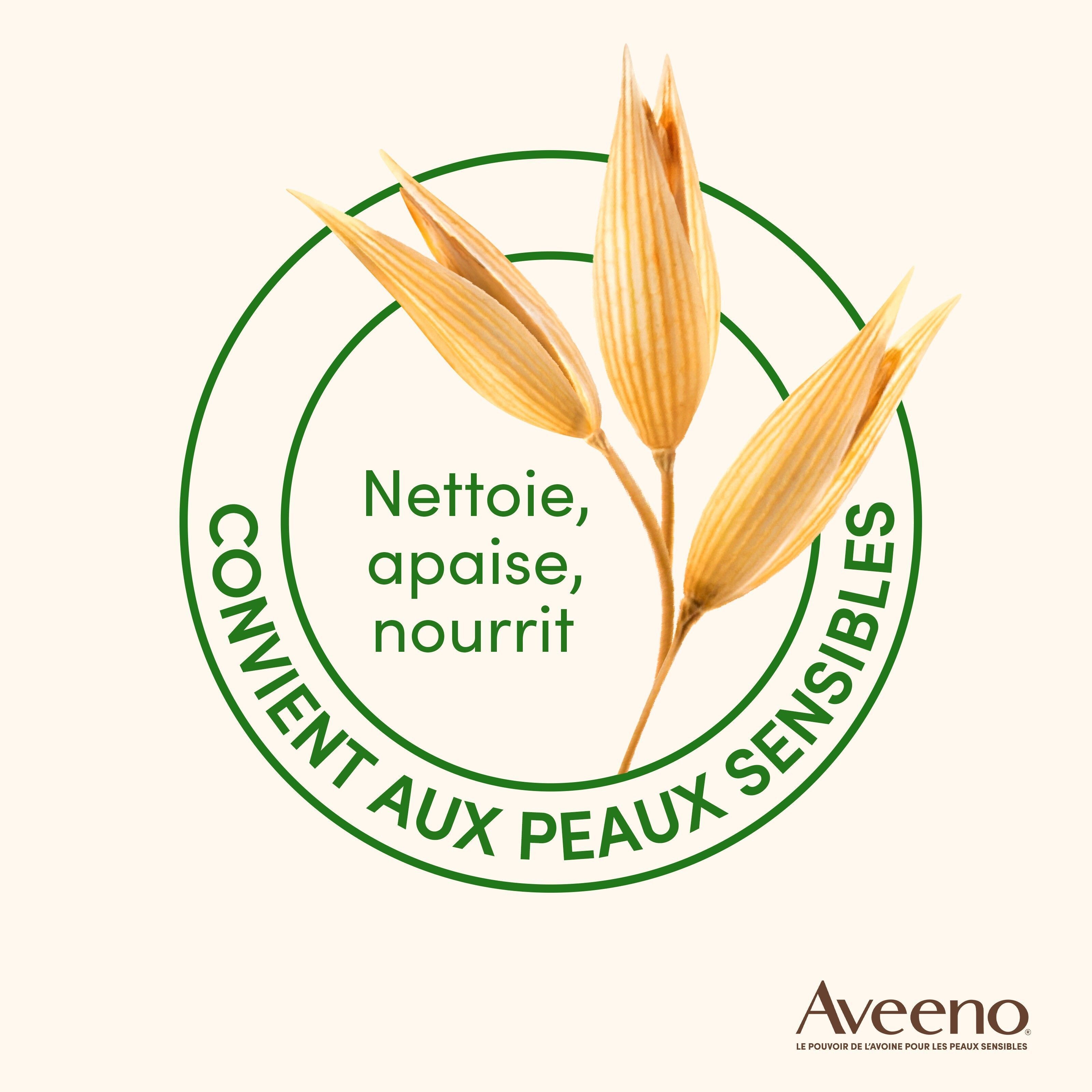 Logo circulaire avec épis d'avoine. Texte: Nettoie, apaise, nourrit. Convient aux peaux sensibles. Logo Aveeno.