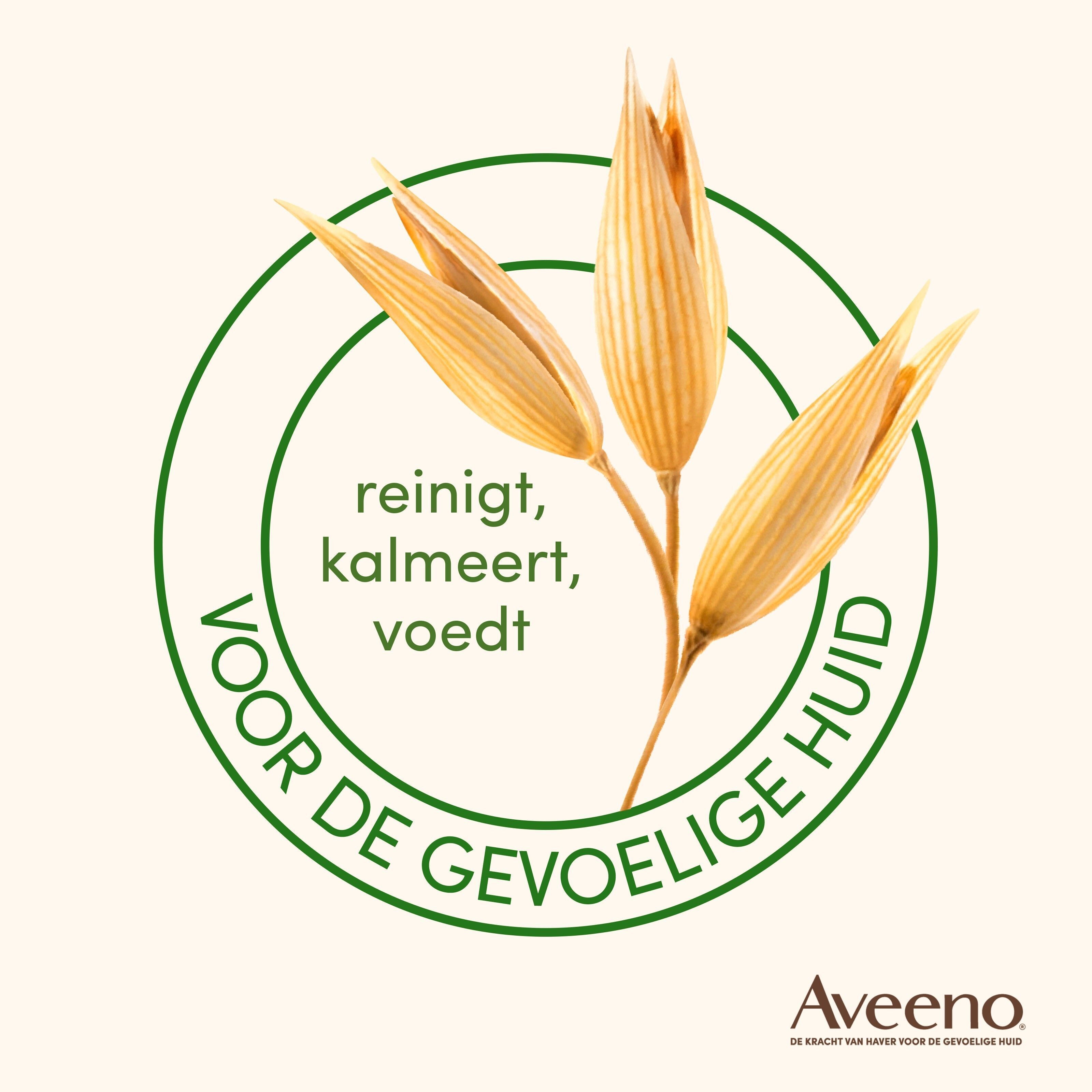 Cirkelvormig logo met haveraren. Tekst: reinigt, kalmeert, voedt. Voor de gevoelige huid. Aveeno logo.