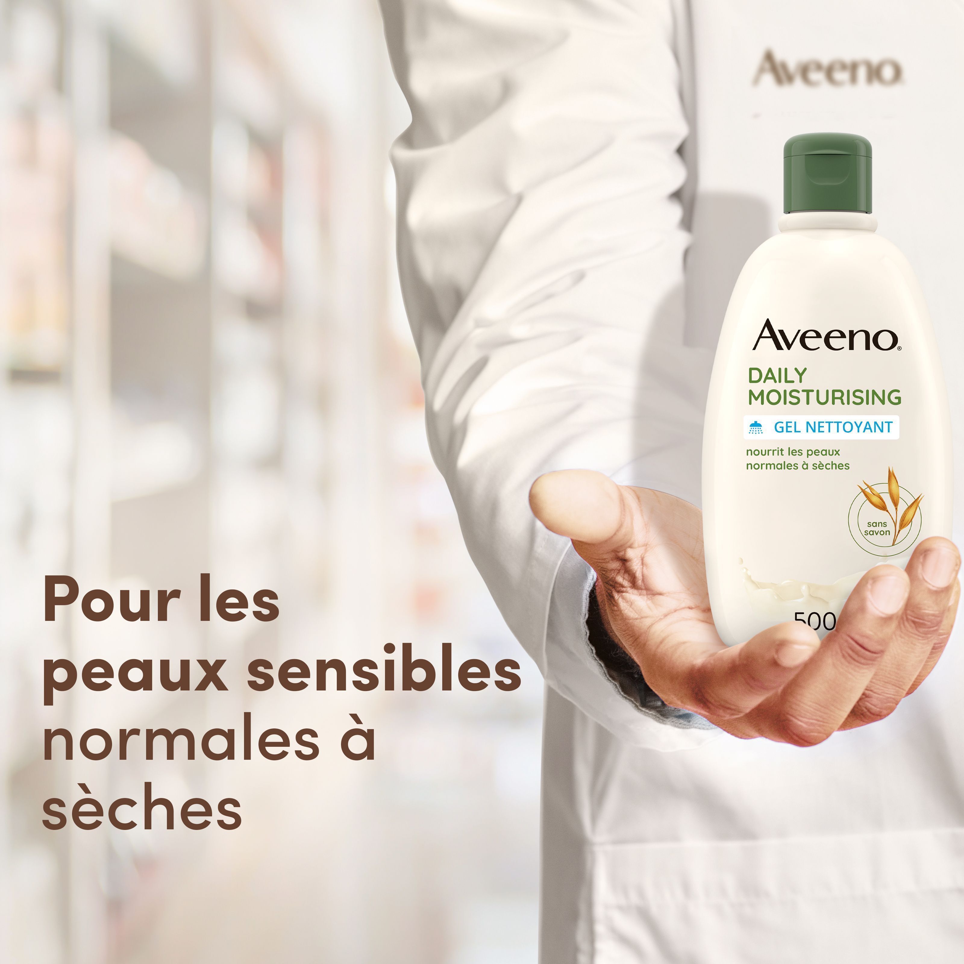 Aveeno Daily Moisturising Gel Nettoyant dans une main. Texte: Pour les peaux sensibles normales à sèches.