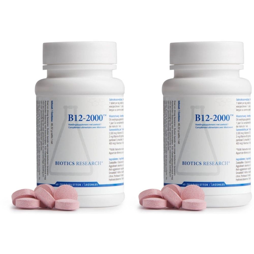 Twee witte flessen met roze tabletten. Opschrift: B12-2000, Biotics Research. Tabletten liggen voor de flessen.