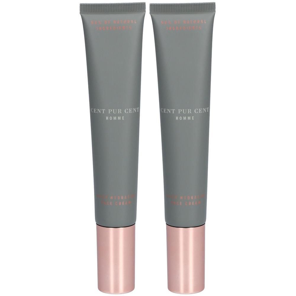 Deux tubes de crème pour le visage. Tubes gris avec bouchons or rose. Texte: Cent Pur Cent Homme.