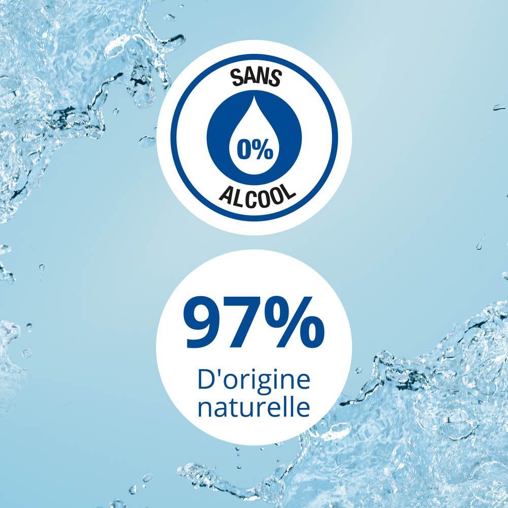 Fond bleu avec texte: Sans alcool 0%. 97% d'origine naturelle.