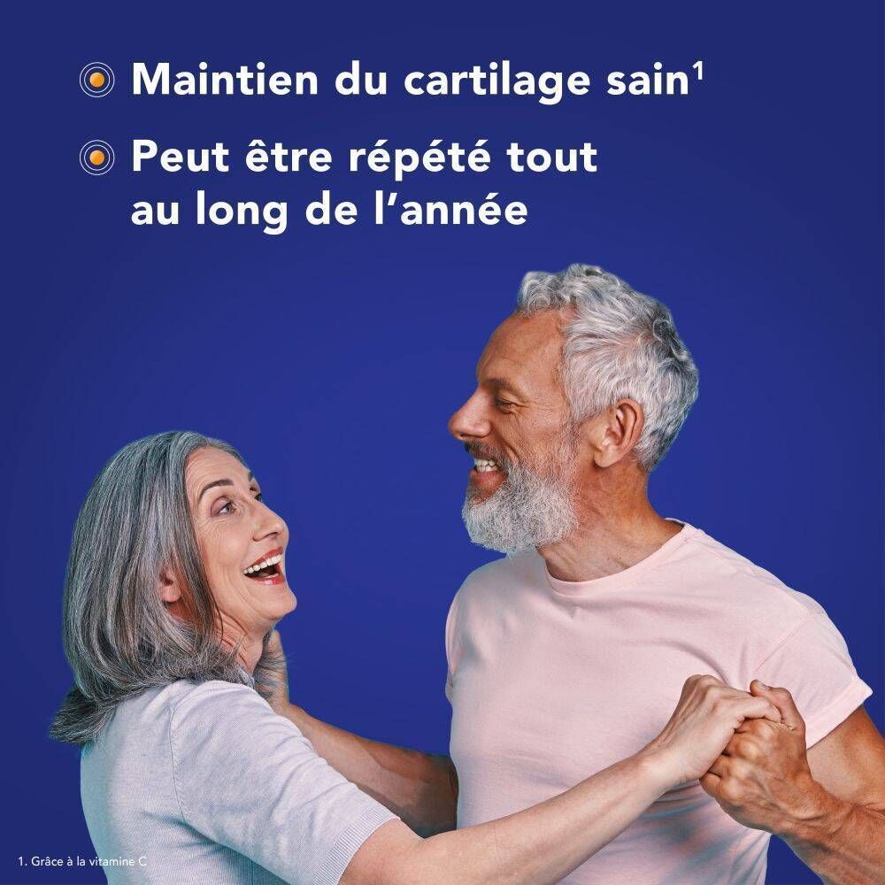 Un couple de personnes âgées danse. Texte : Maintien du cartilage sain, peut être répété toute l'année. Grâce à la vitamine C.
