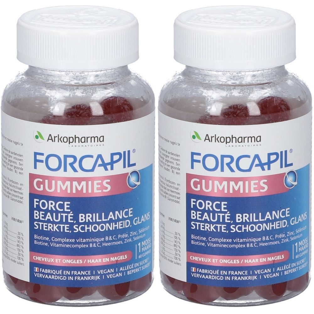Deux flacons de Forcapil Gummies. Inscription : Force, beauté, brillance. Contient biotine, vitamines, zinc et sélénium.