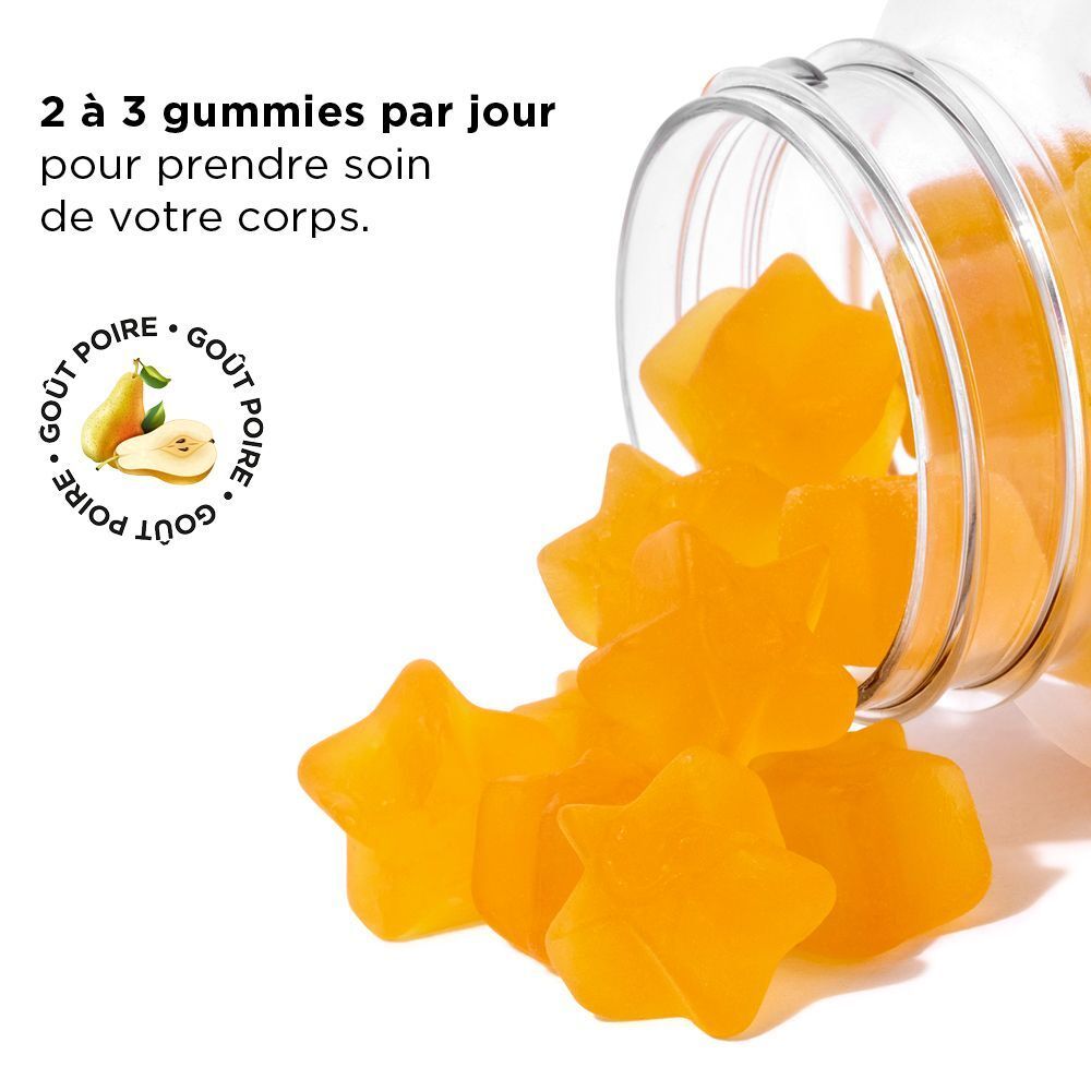 Gummies en forme d'étoiles jaunes qui sortent d'une bouteille. On peut lire "Zinc/Zink" sur la bouteille.