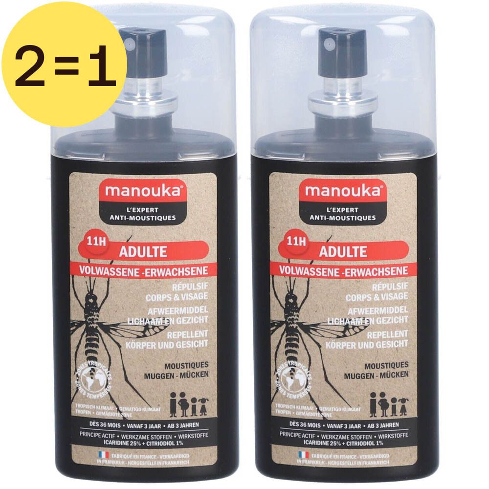 Twee zwarte flessen met label 'Manouka' en 'Adulte'. Geel label met '2=1'.
