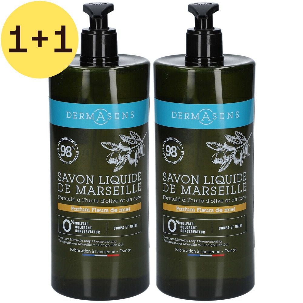 Twee flessen dermAsens Savon Liquide Marseille. Zwarte pompen, blauwe etiketten, opschrift '1+1 GRATUIT'.