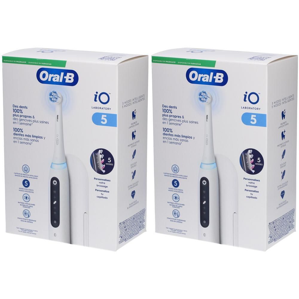 Deux boîtes de brosses à dents blanches. Inscription: Oral-B iO 5, image du produit, texte multilingue.