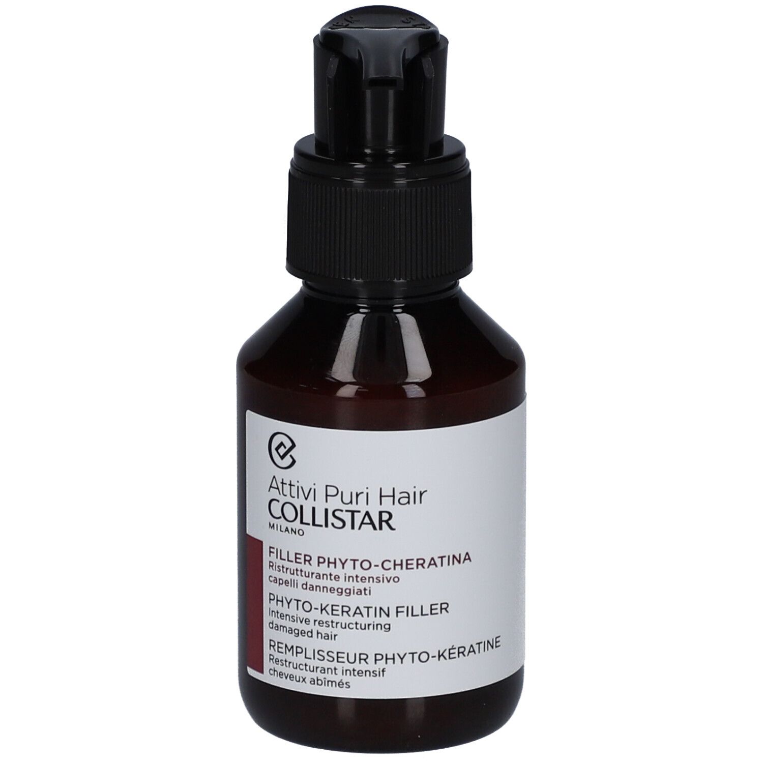 Bruine fles met zwarte pomp. Etiket met "Filler Phyto-Keratina".