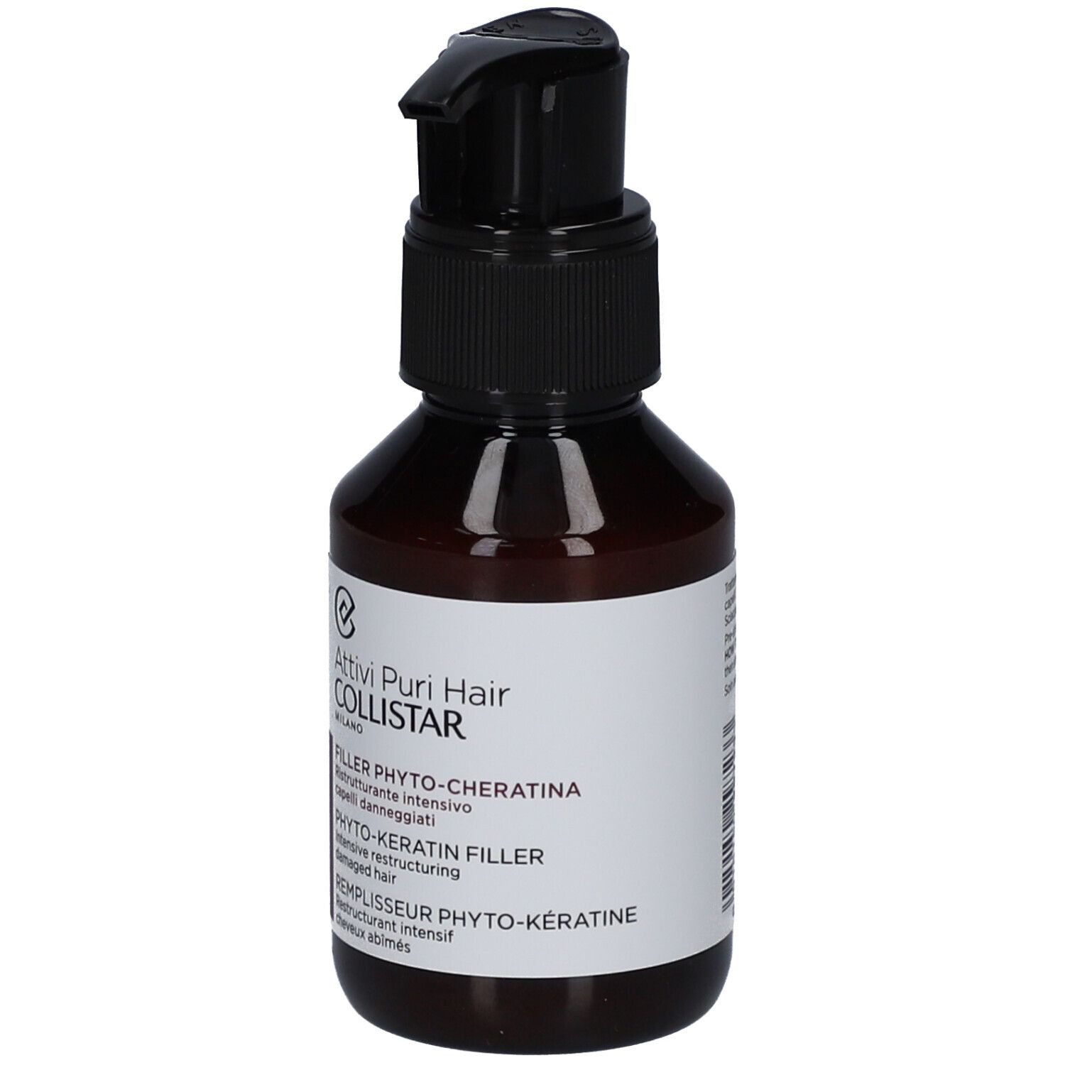 Bruine fles met zwarte pomp. Etiket met "Filler Phyto-Keratina".