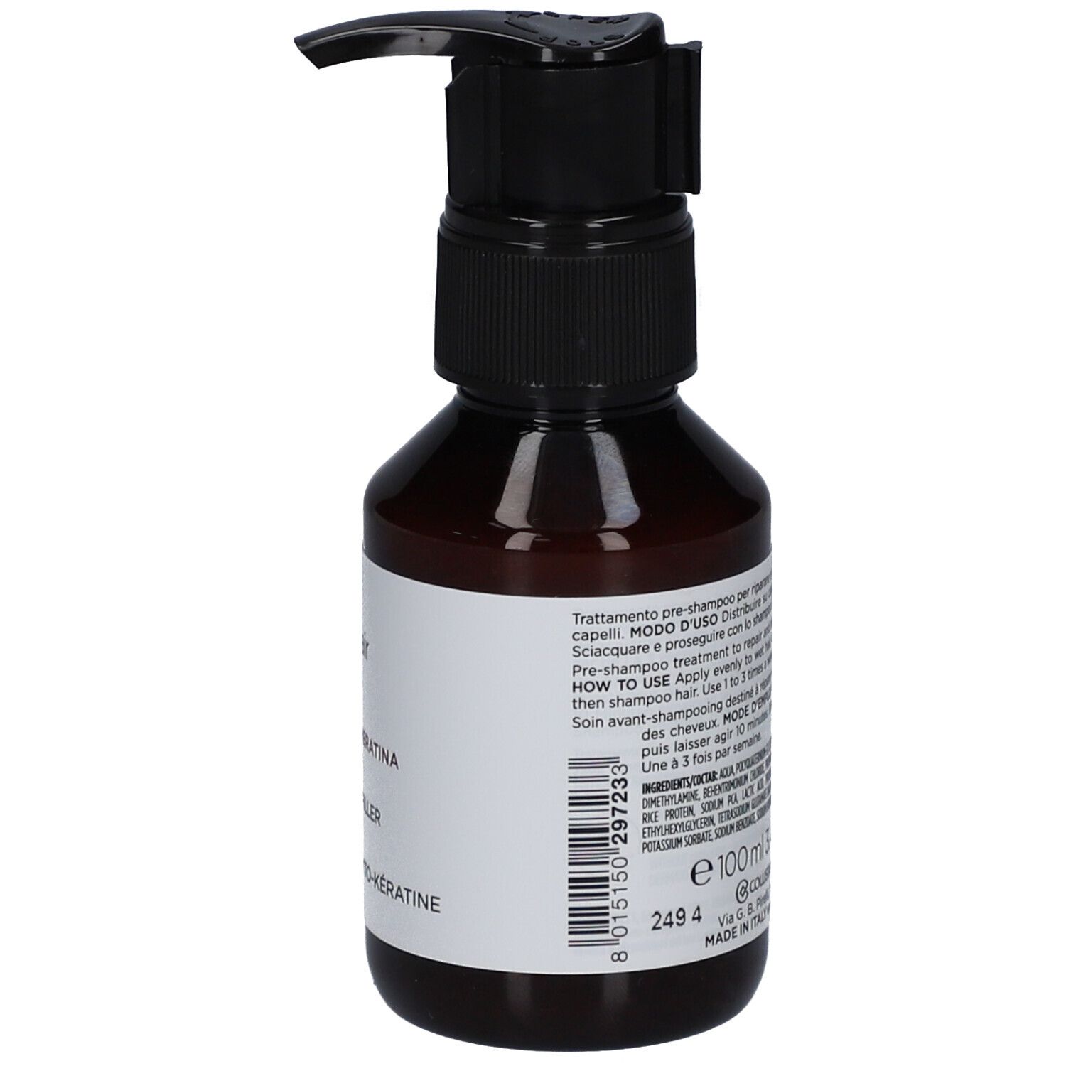 Bruine fles met zwarte pomp. Etiket met "Filler Phyto-Keratina".