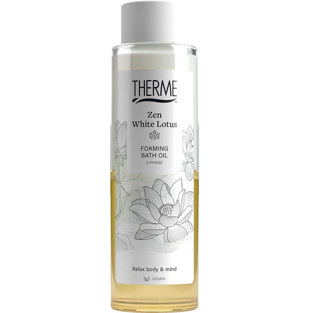 Therme Zen White Lotus Huile de Bain Moussante. Transparante fles met gelige vloeistof en productinfo.