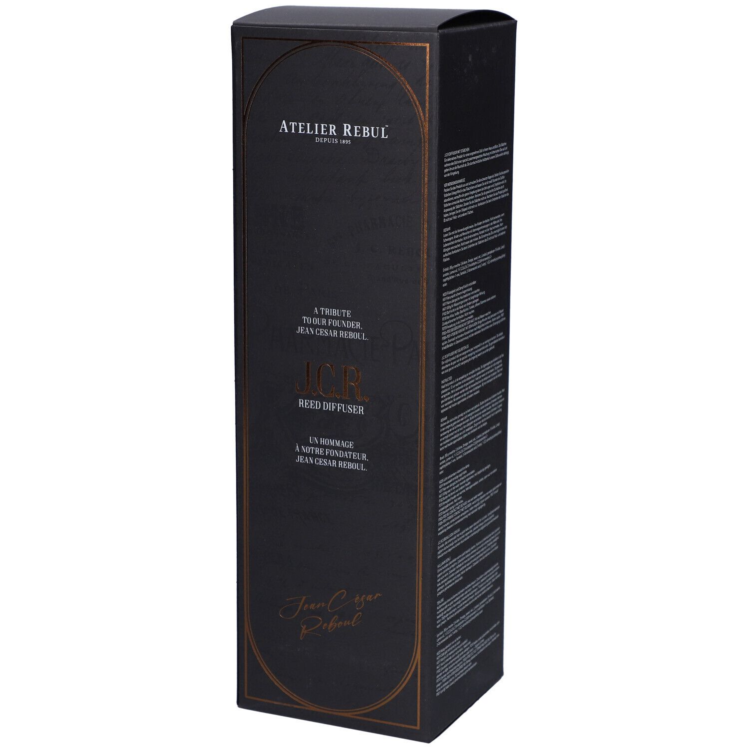 Zwarte doos met gouden kader. Tekst: Atelier Rebul, J.C.R. Reed Diffuser. Handtekening: Jean Cesar Rebul.