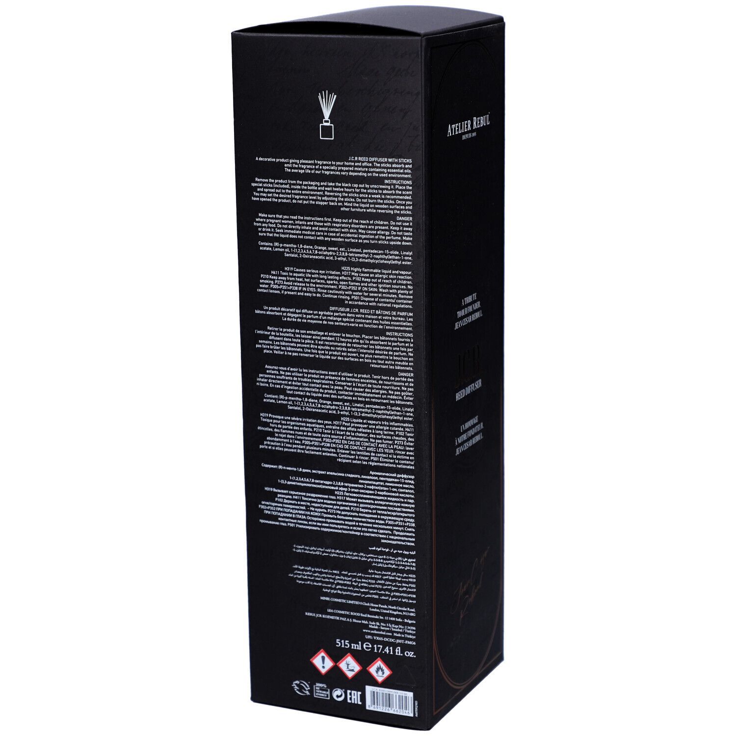 Zwarte doos met tekst. Tekst: 515 ml 17.41 fl. oz. Gevarenpictogrammen. Atelier Rebul. Achterkant van de doos.